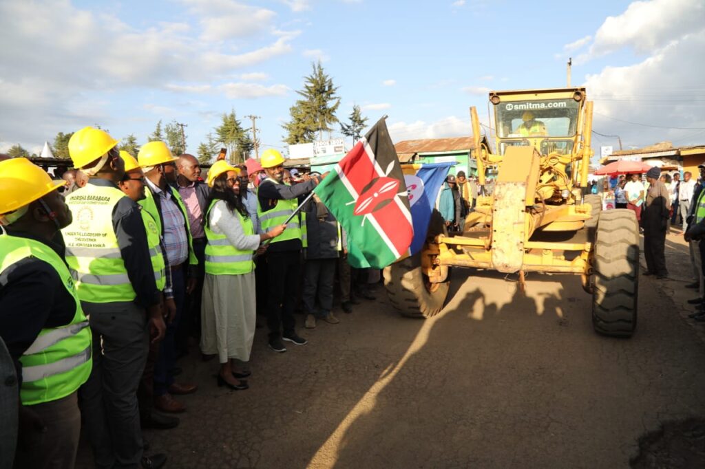 Susan Kihika launching a road for rehabilitaion